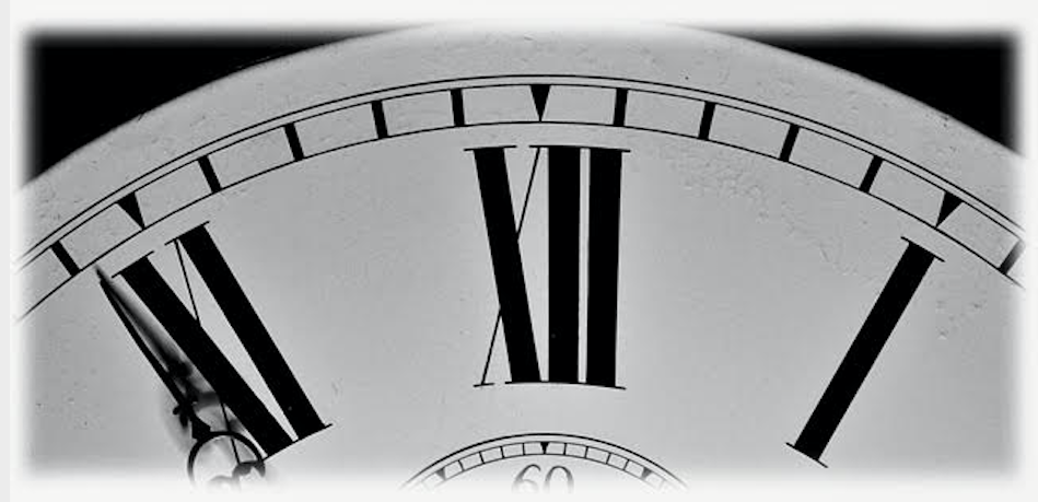 Close up of analogue clock